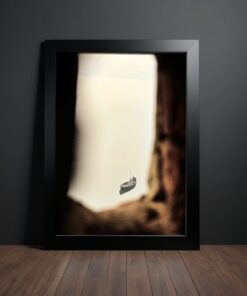 Tranquil Varanasi: Fisherman on the Ganga River Framed Poster